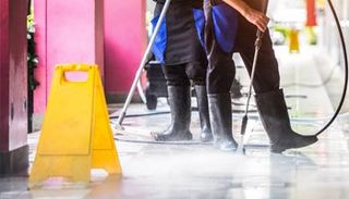 Power Washing the Tile Floor — Kansas City, KS — The Kansas Paint Company Power Washing the Tile Floor — Kansas City, KS — The Kansas Paint Company