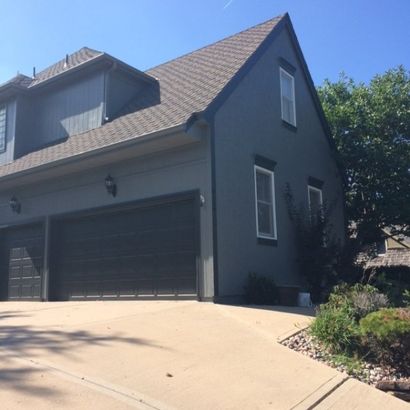 Blue House with Garage — Kansas City, KS — The Kansas Paint Company
