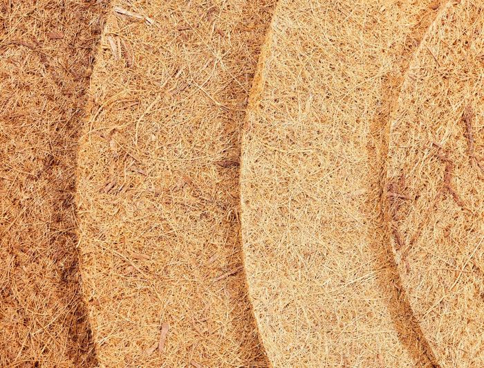 A close up of three pieces of wood stacked on top of each other.