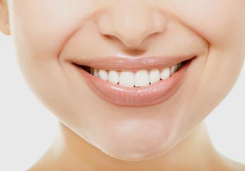 A lady smiling confidently