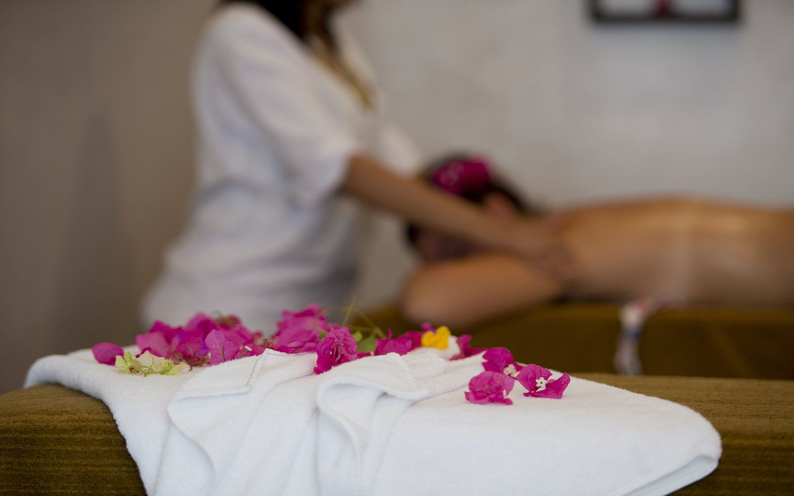 Spa treatment room with massage table