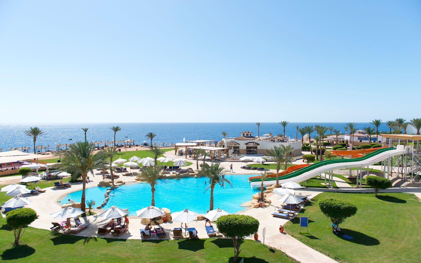 Panorama Bar view at Amphoras Beach  with sea, pools, and garden