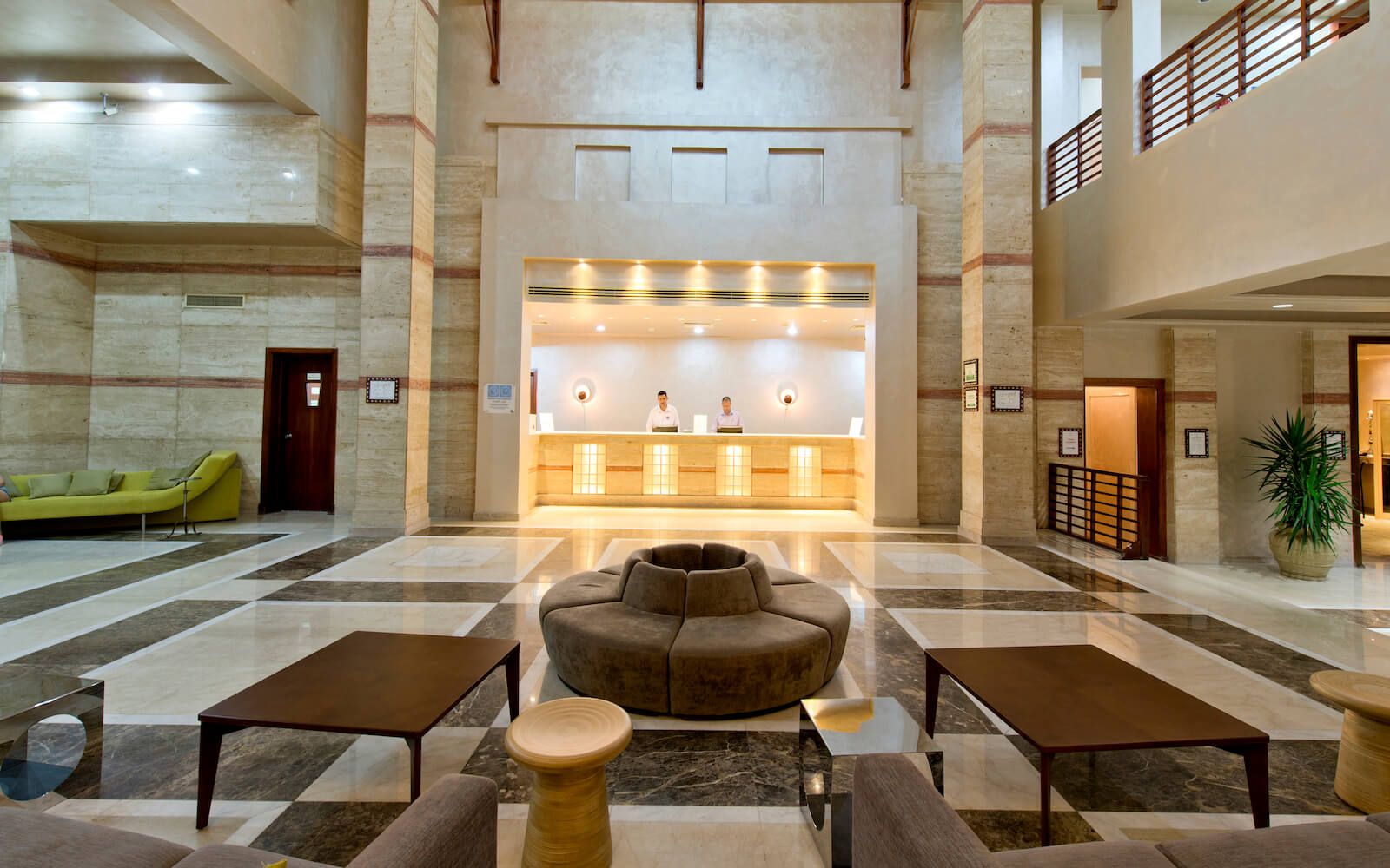 Spacious reception area with stylish decor and natural lighting.