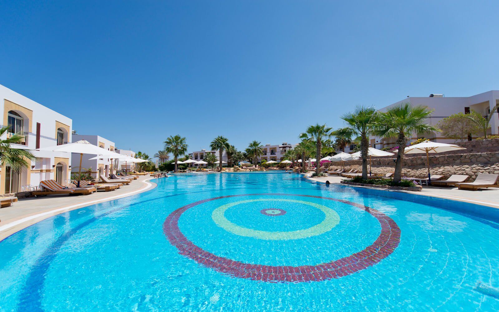 Infinity pool with breathtaking views of the resort’s beach and sea.