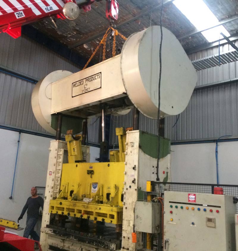 heavy machine being lifted