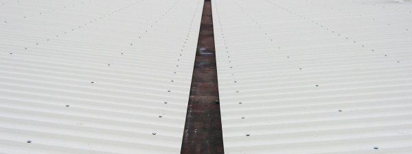 posa tegole per copertura abitazione