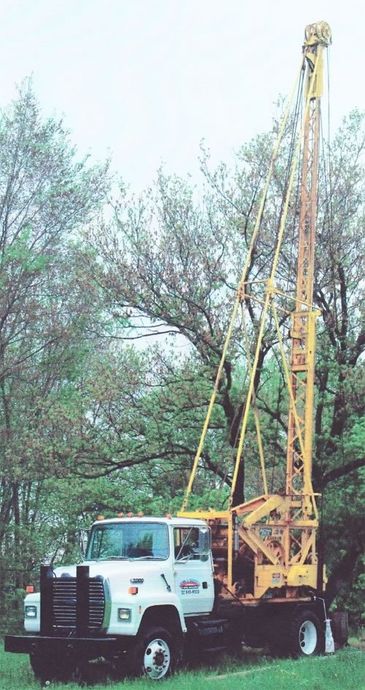 Image of water well drilling truck