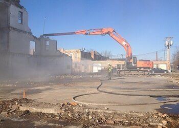 Bulldozer Wrecking a House — Wrecking & Demolition Contractors in Osceola, IN