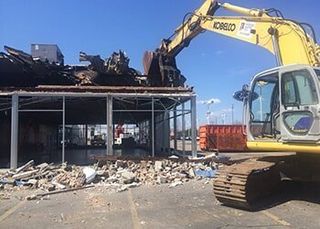 Bulldozer clearing soil — Site Development Contractors in Osceola, IN Bulldozer clearing soil — Site Development Contractors in Osceola, IN