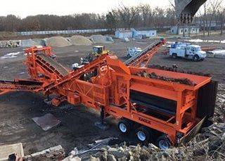 Group of workers and a bulldozer — Site Development Contractors in Osceola, IN Group of workers and a bulldozer — Site Development Contractors in Osceola, IN