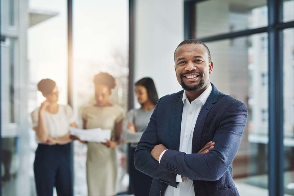 Group of businesspeople standing in the office