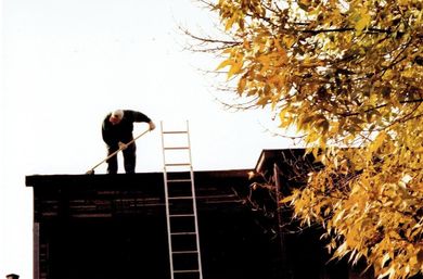 Man making the construction for solar panels — Home Improvement in Hills, IL Man making the construction for solar panels — Home Improvement in Hills, IL