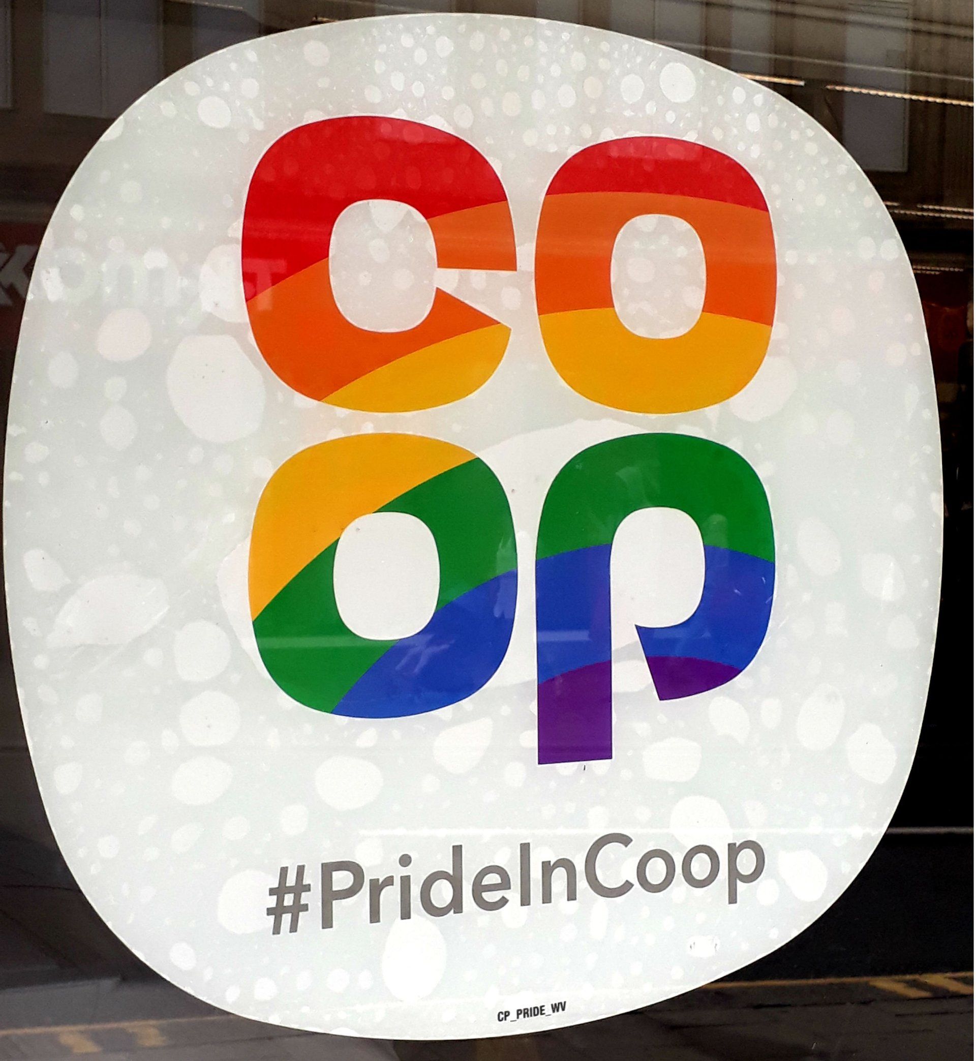 A sign that says pride in coop on it