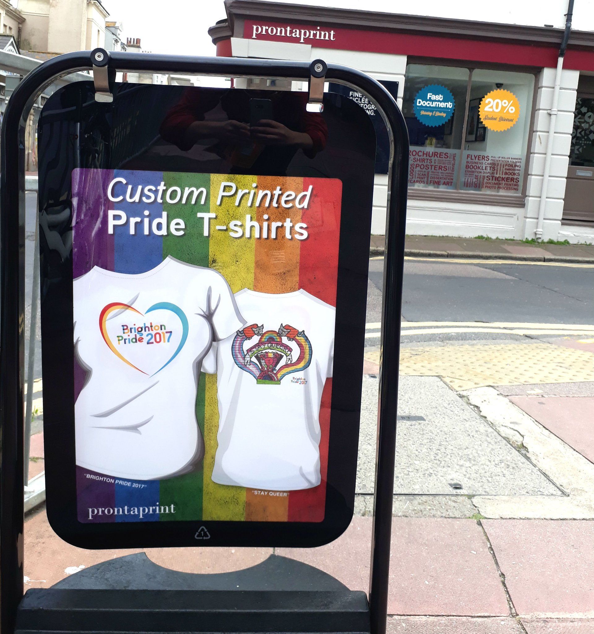 A sign that says custom printed pride t-shirts