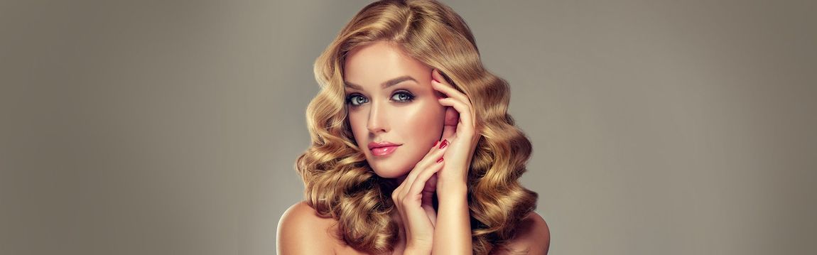 hair lounge cut colour style girl with shiny curly hair