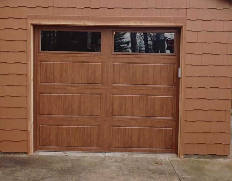 Wooden Garage Door With Two Windows — Port Washington, WI — Jiffy Overhead Door, LLC Wooden Garage Door With Two Windows — Port Washington, WI — Jiffy Overhead Door, LLC
