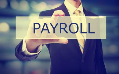 Man Holding a Digital Payrol Card - Accounting in Minneapolis, MN Man Holding a Digital Payrol Card - Accounting in Minneapolis, MN