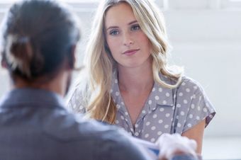 unhappy woman in meeting