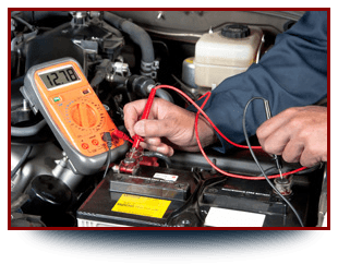 For a fantastic range of garage services in Coventry call Mason Road Garage A mechanic checking an engine with diagnostic equipment.