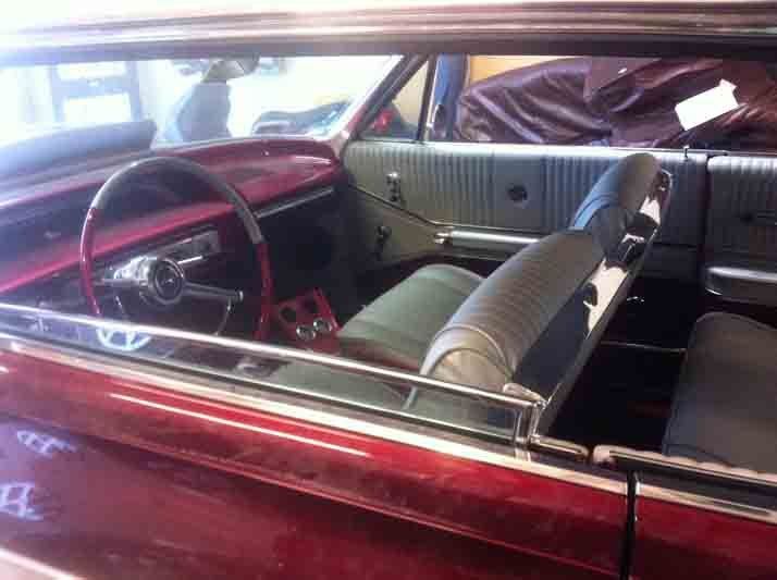 New upholstery being installed in the car