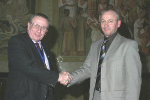 two men shaking hands