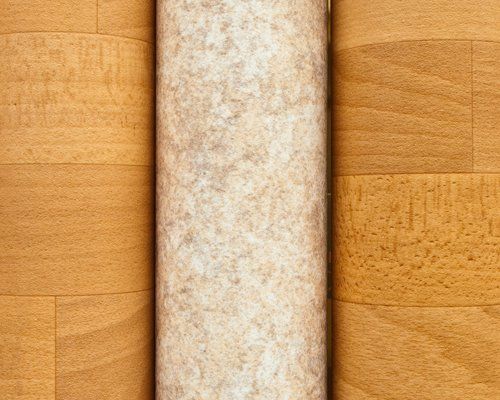 Rolls of vinyl laminated flooring close up
