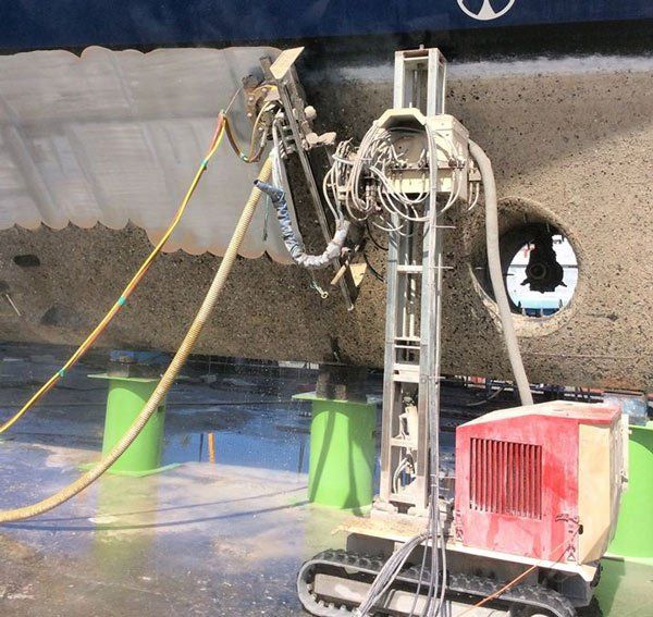 robotic waterblaster stripping paint