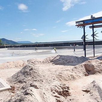 people wet sandblasting concrete floor