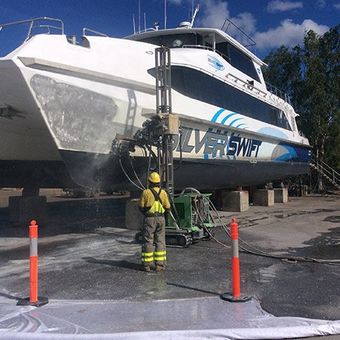 worker preparing a boat