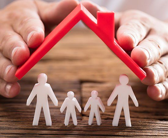 Person Protecting Family Figures — Kokomo, IN — David Akers Insurance Person Protecting Family Figures — Kokomo, IN — David Akers Insurance