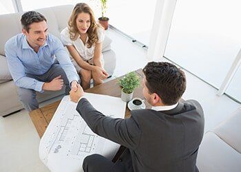Couple Meeting with a Financial Adviser — Friendly Finance in Central City, KY