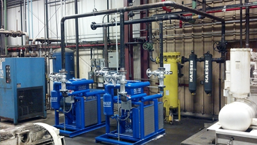 Packed Bottle Moving on Conveyor Belt — Engineering System Service in Seymour, IN Packed Bottle Moving on Conveyor Belt — Engineering System Service in Seymour, IN