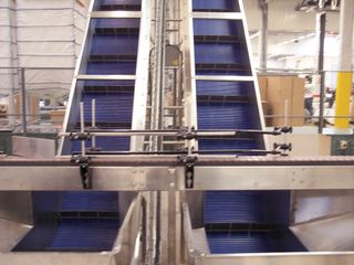 Packed Bottle Moving on Conveyor Belt — Engineering System Service in Seymour, IN