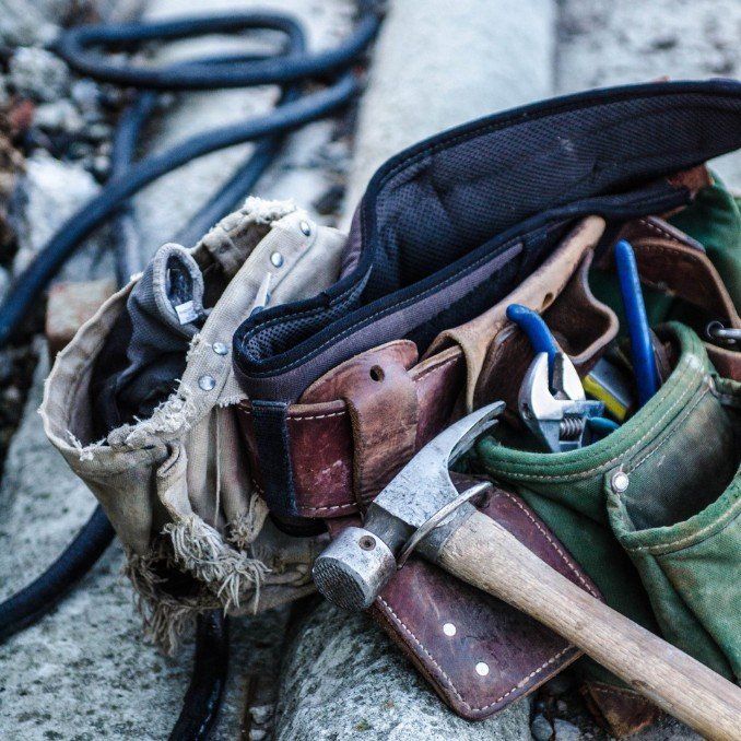 a tool belt with tools on it