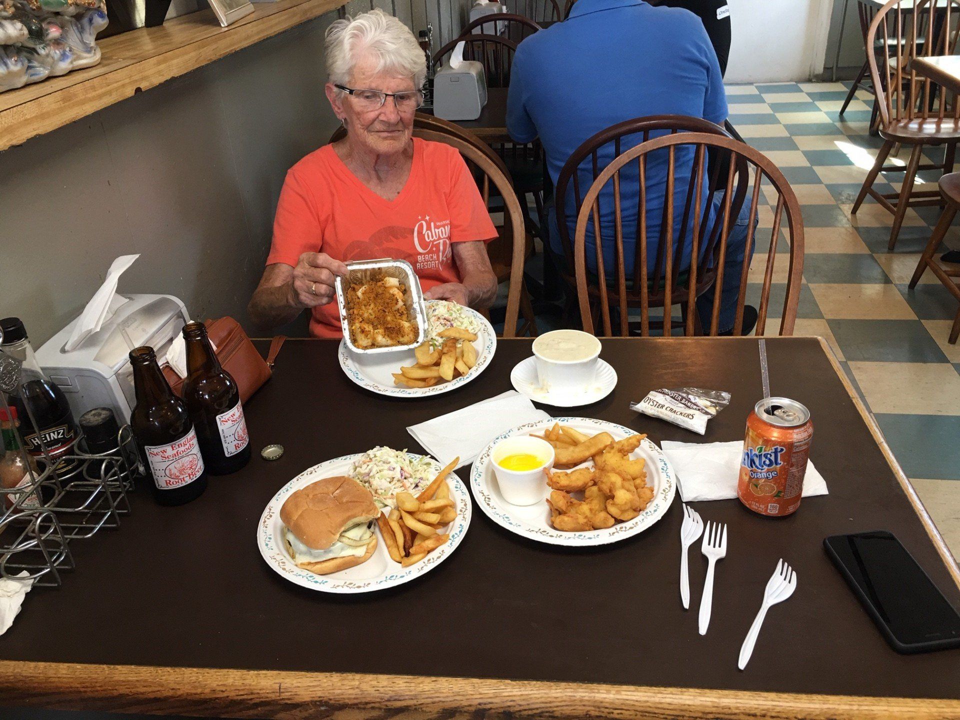 Fish Market New England — Patron Eating of Seafood Dishes in Methuen, MA Fish Market New England — Patron Eating Seafood Dishes in Methuen, MA