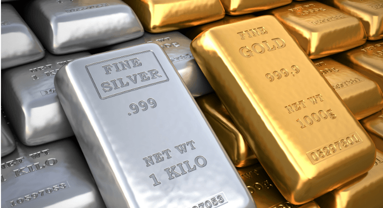 Silver and gold bullion bars stacked together, engraved with weight and purity markings.