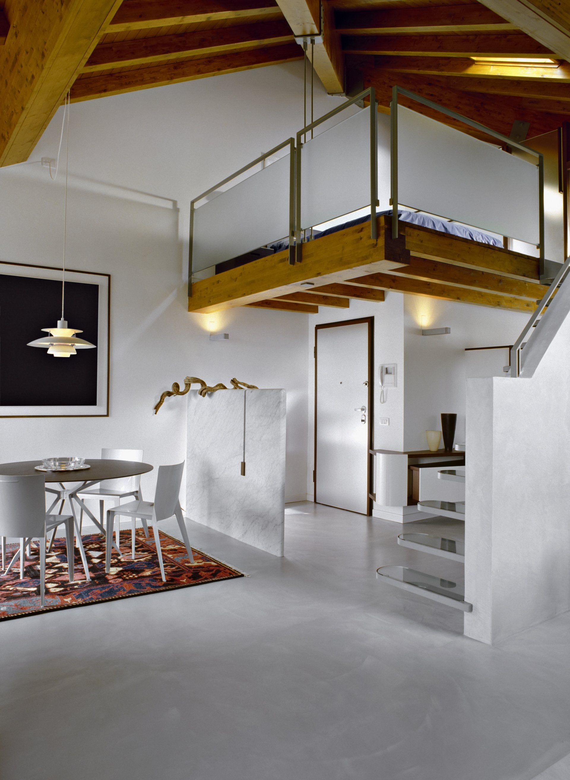 light grey resin floors in open plan kitchen