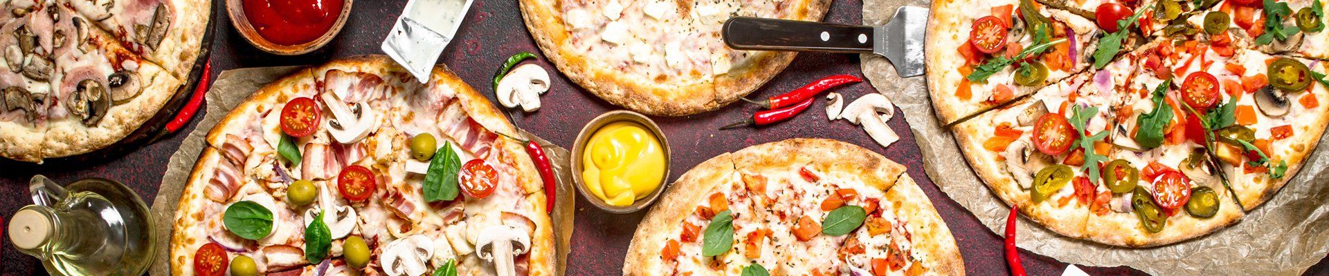 Best Pizza — Delicious Different Pizza On The Table in Pleasanton, CA