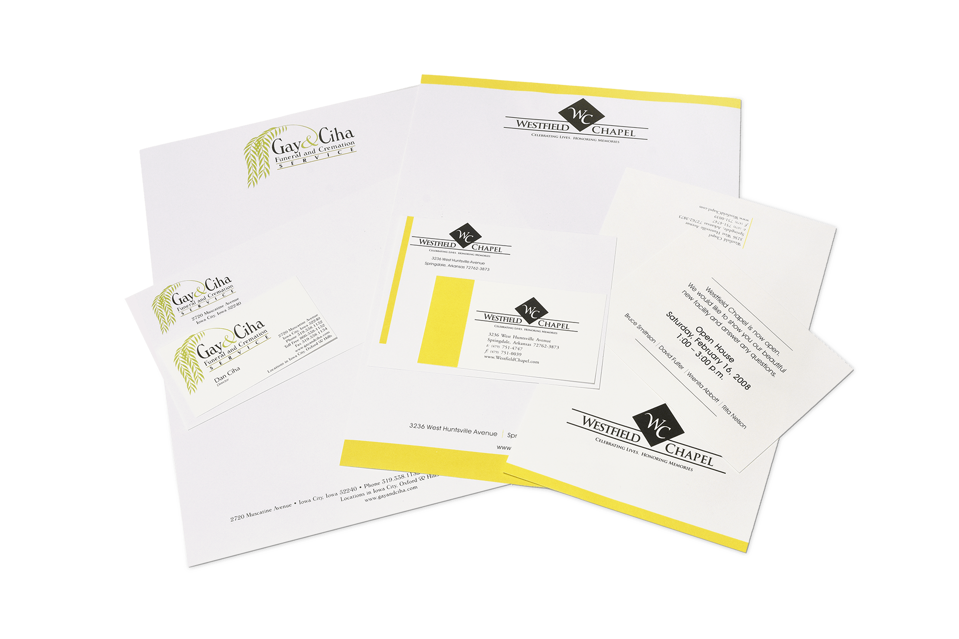 A set of letters , envelopes , and business cards on a white background.