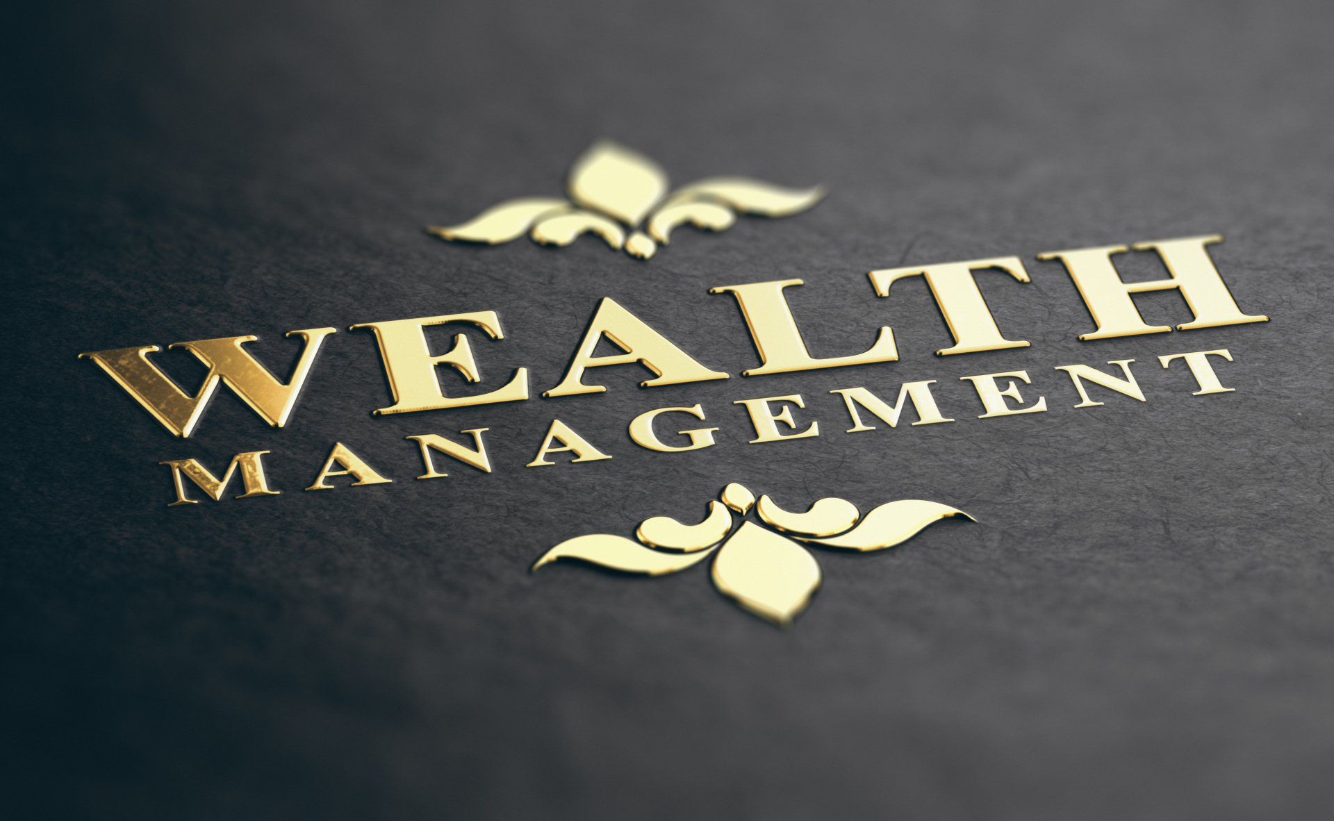 A gold logo for wealth management on a black background