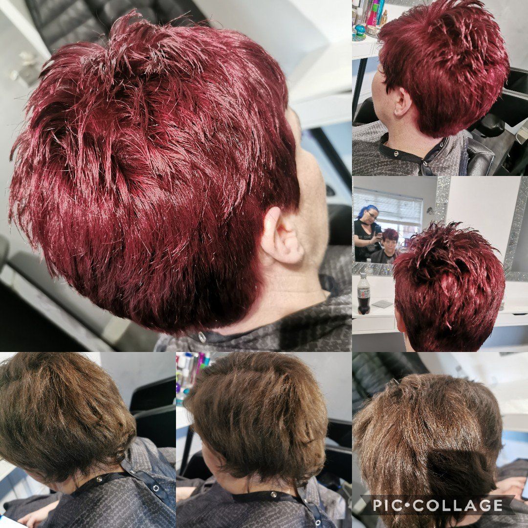 A woman with red hair is getting her hair cut