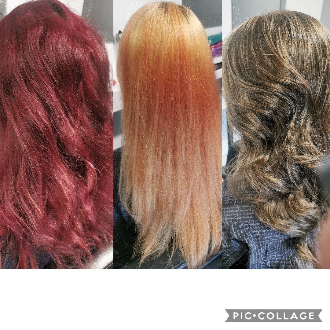 Three women with different colored hair are sitting next to each other.