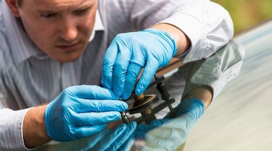 Auto glass repair mechanic — Auto Glass Replacement in Norcross, GA