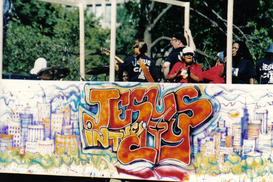 The word jesus that is on a wall
