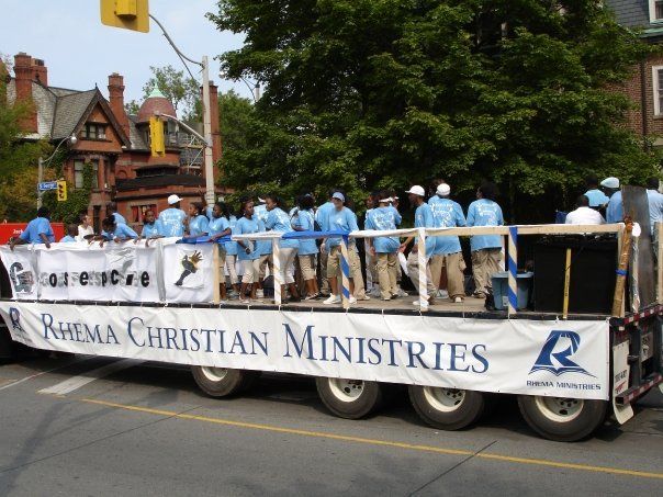 A float in a parade sponsored by rhema christian ministries