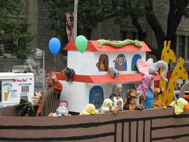 A float in a parade has the number 8 on it