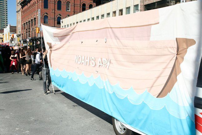 A large banner with a boat on it that says noah 's ark