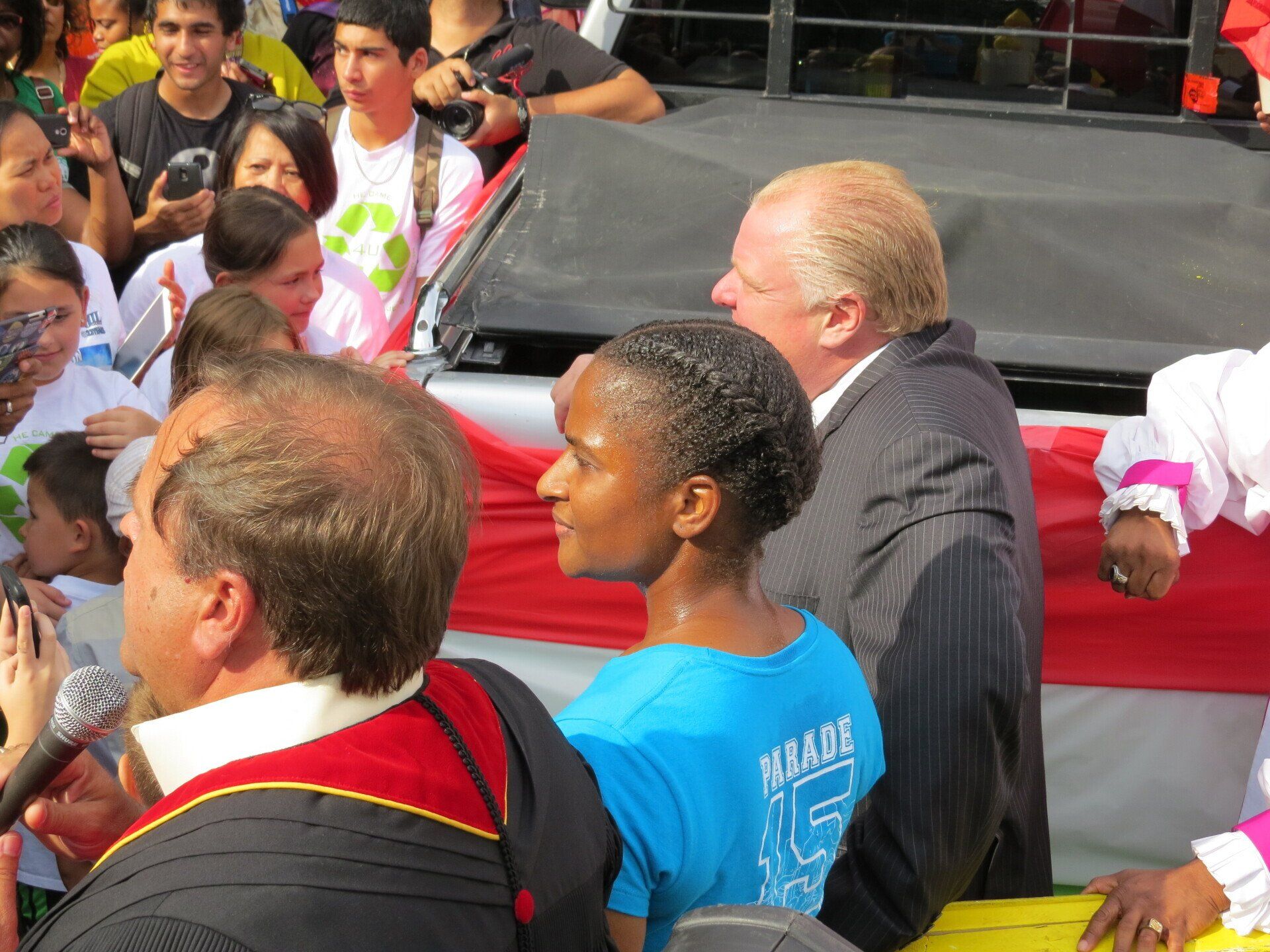 A woman in a blue shirt with the number 15 on it