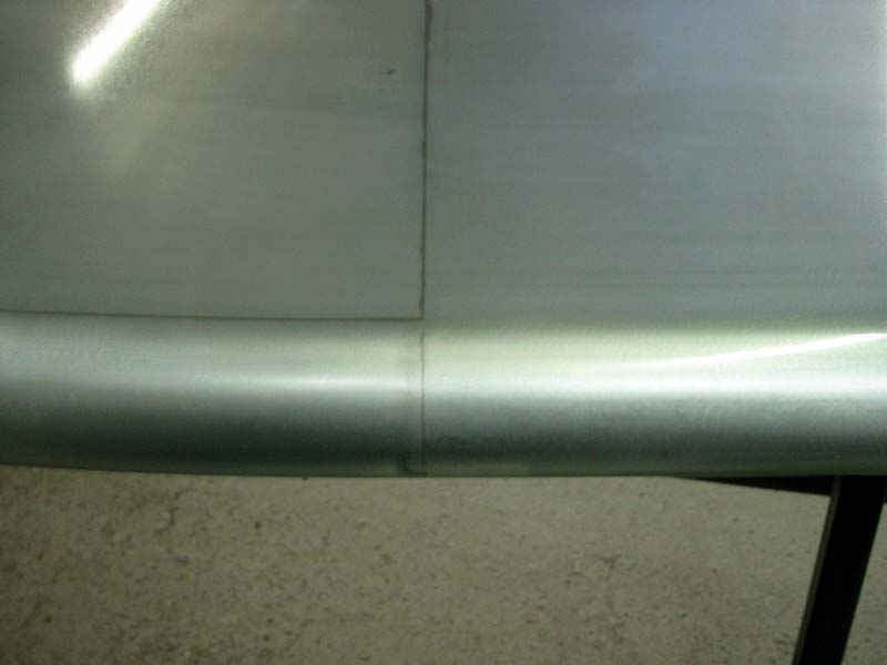 A close up of a piece of metal on a table.