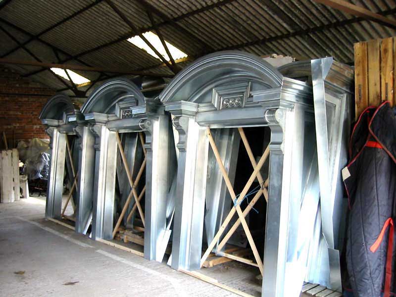 A warehouse filled with a lot of metal pieces